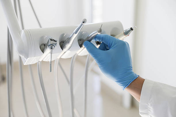 Professional Root Canal Treatment technician working in New Middletown, OH